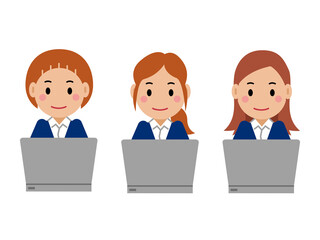 パソコンを操作する紺色スーツの若い女性。その2