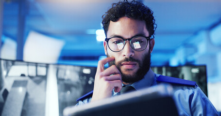 CCTV, tablet and thinking with man in office at night for monitoring, protection or safety....
