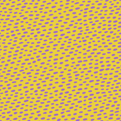 Pattern dot polka seamless background in yellow and purple. Bold abstract texture print perfect for retro design or trendy fabric