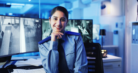 CCTV, face and security with woman in office at night for government, law enforcement or...