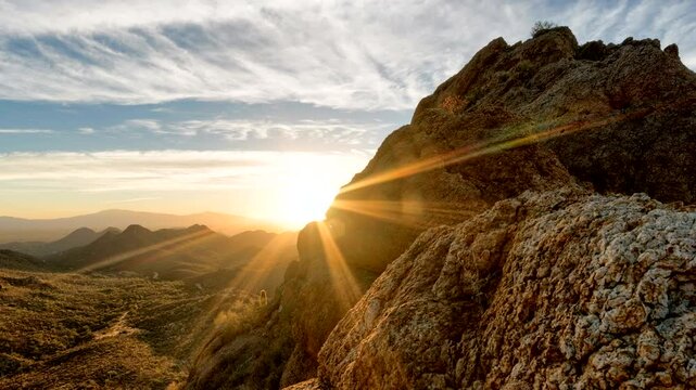 Sunrise behind the mountains in the desert