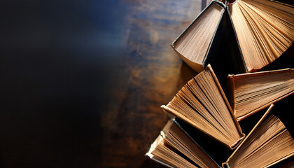 Naklejka premium Old books arranged highlighting their historical significance. Neatly arranged representing a collection of wisdom