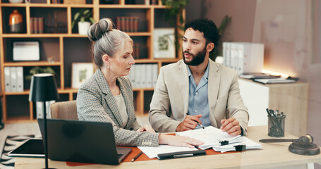 Business, people and meeting with paperwork in office for legal advice, information and review case. Mature woman, attorney and documents for settlement, company contract and procedure for management