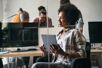 Software, coding and business woman on tablet thinking of data analytics, digital technology.