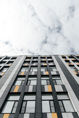 modern office building with glass windows, urban geometric pattern, business center, skyscraper in metropolis, abstract background, copy space, vertical