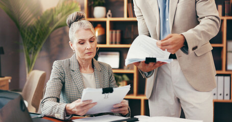 Woman, lawyer and meeting with paperwork in office for legal consulting, review contact and company...