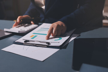 Expert woman asian female people review data number costing managerial account prepare monthly...
