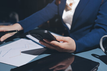 Expert woman asian female people review data number costing managerial account prepare monthly actual cost variance report at tax audit office. ESG sheet budget control ERP process service project.