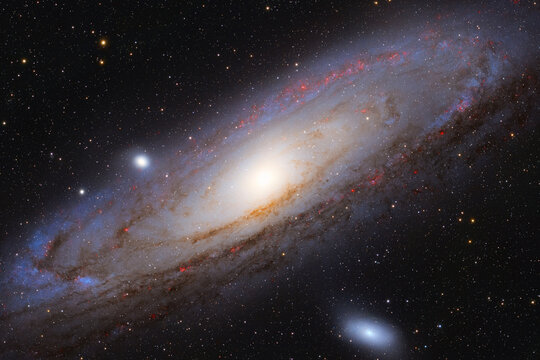 Andromeda Galaxy (M31, Messier 31), its satellite galaxies (M32 and M110) and hundreds small galaxies in the background in the Andromeda constellation