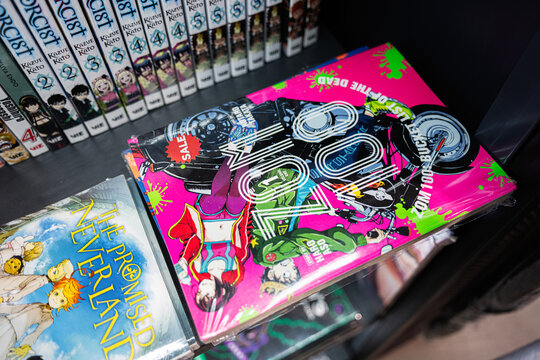 Collection of Manga Covers Featuring Vibrant Anime Zom 100 Artwork and Titles