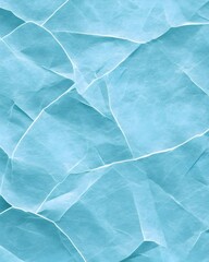 Obraz premium Crinkled, light-blue fabric with visible texture and creases