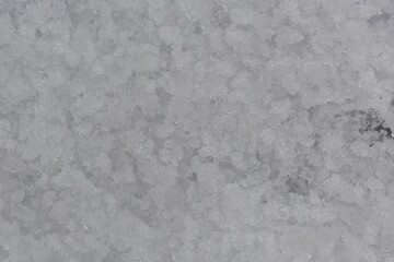 A close up of a snow covered surface with a lot of ice