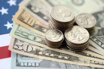 American US dollars money bills and on American flag close up