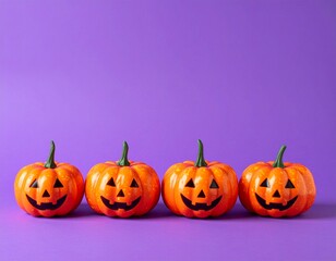 紫の背景に複数のジャックランタンが横一列に並んでいる