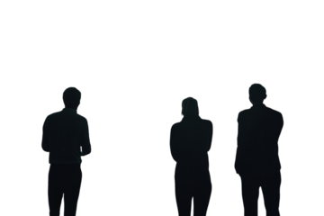 Team brainstorming ideas on a glass board late night intense focus problem solving session