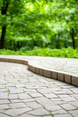 Stone path curving gently through a lush green park