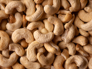 Full frame Cashew nuts background. Vegetarian Organic Healthy snack concept.