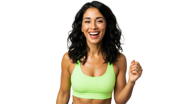 A happy, fit woman in her 30s or 40s with dark curly hair smiles broadly while wearing a bright green sports bra against a transparent background, looking energetic and healthy.