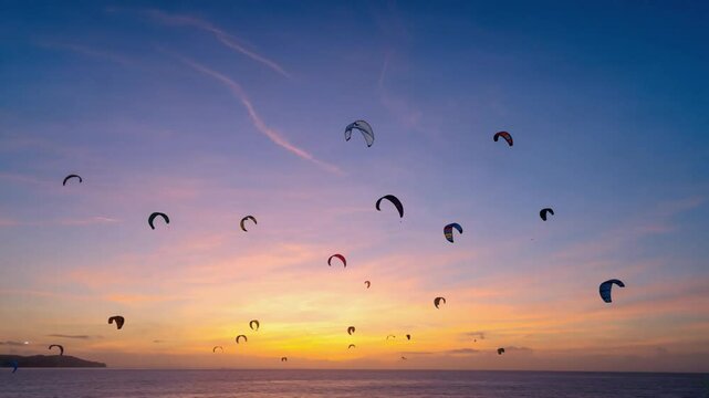 Colorful sunset with kitesurfing.