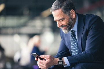 Senior businessman on the go