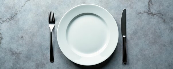 Empty plate, fork, knife on grey background  Top view , restaurant, composition