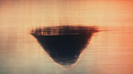 Abstract water reflection of an island.  A blurry, triangular-shaped island is mirrored in the water's surface, creating a soft, muted color palette of beige, orange, and dark brown hues.