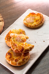 Puff pastry with cheese and shrimp. Pastry. food