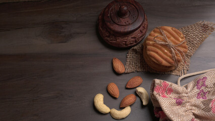 Tasty Cookies with sesame seeds on wooden board. Healthy vegan cookies.