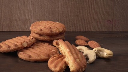 Tasty Cookies with sesame seeds on wooden board. Healthy vegan cookies.