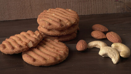 Tasty Cookies with sesame seeds on wooden board. Healthy vegan cookies.