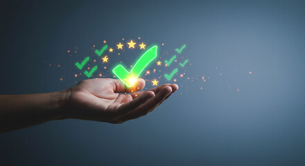 A hand holding a glowing green check mark with stars and smaller check marks floating around it on blue background