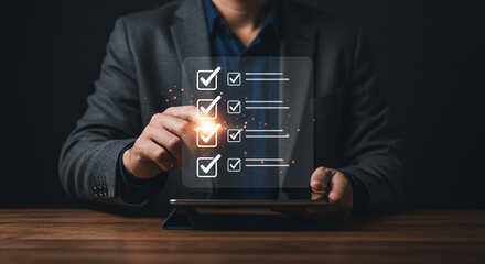 Naklejka premium A person in a suit interacting with a digital checklist on a tablet against a dark background scene