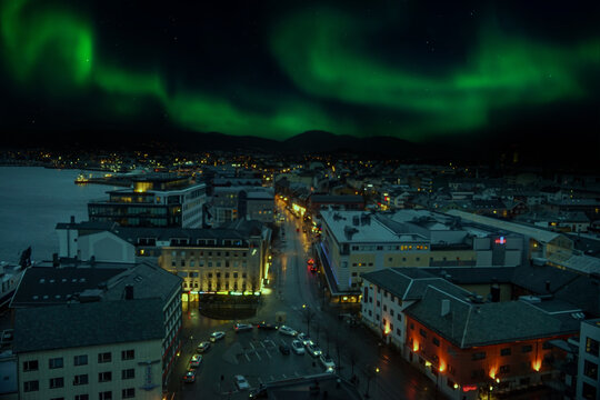 Bod&oslash;, a city north of the Arctic Circle, offers stunning views of the aurora borealis. The Northern Lights dance across the night sky, creating a magical spectacle.