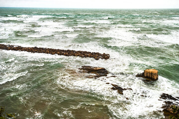 View of the Italian town of Vieste during a storm and cloudy weather. Sad atmosphere of the popular holiday destination Vieste.