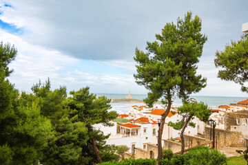 View of the Italian town of Vieste during a storm and cloudy weather. Sad atmosphere of the popular holiday destination Vieste.