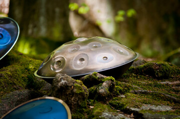 handpan outdoors near a waterfall