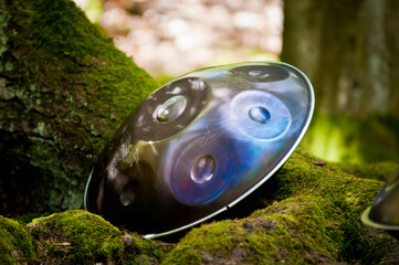 handpan outdoors near a waterfall
