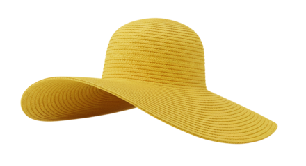 Isolated yellow straw sun hat with a wide brim on a black background offering sun protection and style
