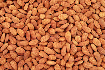 Background of Almonds nuts close-up, natural and healthy food concept for backgrounds and backdrops