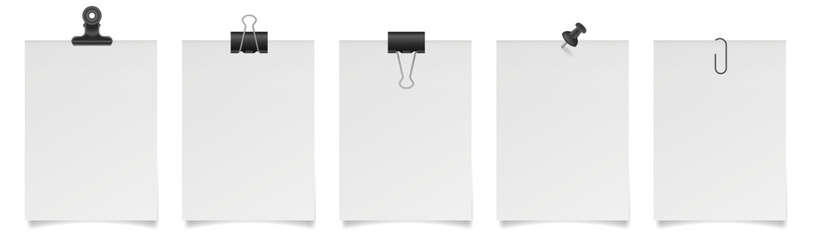 Set of white paper notes with binder clips, bulldog clip, paper clip and push pin. White sheets of paper. Black holders