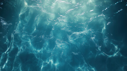 Obraz premium Sunlight filters through clear water creating shimmering patterns in a serene aquatic environment