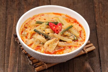 Sayur Labu atau Sambal Goreng Labu. Chayote fried chili sauce is cooked with shallots, garlic, red chilies, fried shrimp paste, tamarind, coconut milk, red chilies, green chilies, galangal, lime leave