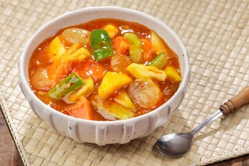 Rujak kweni or rujak aceh is a type of typical Acehnese rujak made from mashed kweni mango with chili, sugar, salt and tamarind juice.