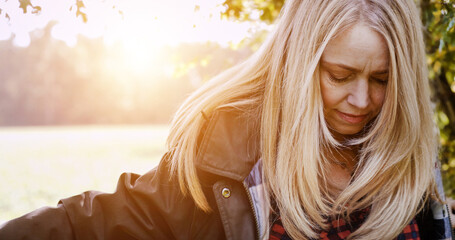 Travel, relax and woman in nature with freedom, peace and calm outdoor with lens flare. Forest, lake and female person outdoor for adventure, fresh air or experience, journey or vacation in Amsterdam