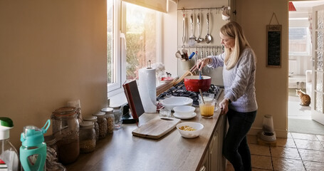 Woman, healthy food and cooking in kitchen, diet and nutrition or prepare ingredients at home. Female person, process and relax or gourmet skills, wellness and vision or fresh, stirring and pot