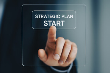 A close-up a finger pressing a clear digital interface symbolizes business strategy and decision-making to drive innovation and growth