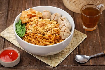 Mie Yamin atau Mie Ayam. Yamin noodles are synonymous with sweet taste. Served with fried dumplings and meatballs