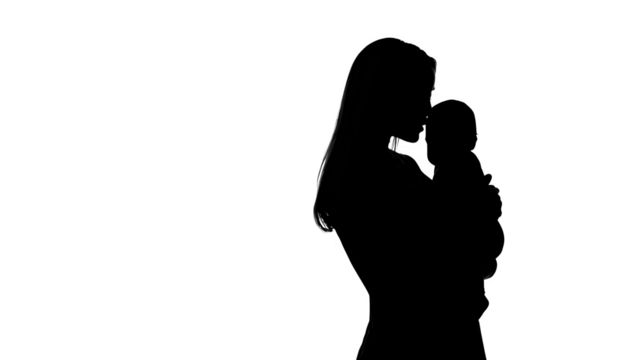 Silhouette of a mother holding a baby, black color, isolated with transparent background