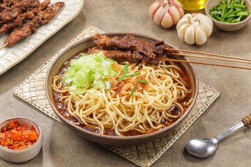Mie Ongklok. Ongklok noodles are boiled noodles typical of the city of Wonosobo and. its surroundings. These boiled noodles are made using cabbage, chopped chives, and a thick, starchy sauce called lo