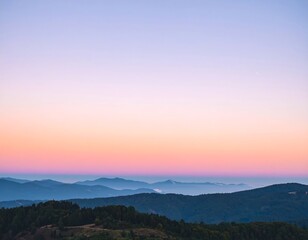 Fototapeta premium Pastel Sunset over Mountain Ranges